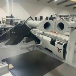 open extraction arm closer